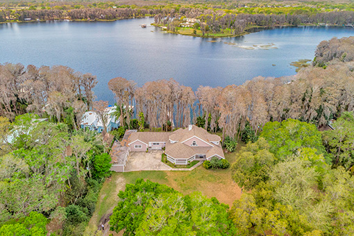 Aerial Shot of a House by the Lake Taken by a Tampa-based Real Estate Photographer