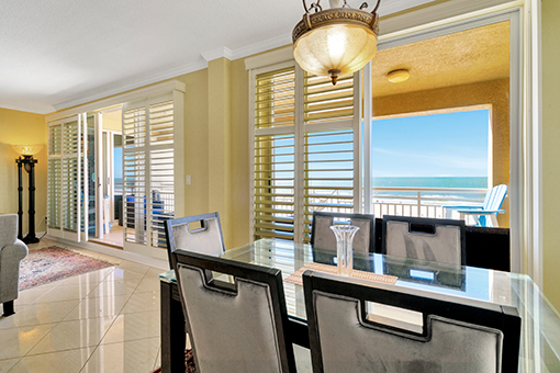 Image of a Dining Room with Beachview Taken by a Clearwater Real Estate Photographer