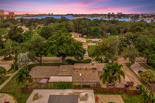 Real Estate Photographer's Aerial Shot of a Property in Palm Harbor, Pinellas County Taken During Sunset