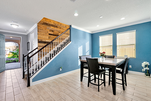 Photo of Dining Room and Staircase in Hillborough County Captured by a Real Estate Photographer