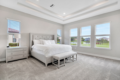 White and Gray-themed Bedroom of a Lutz Home Photographed by a Real Estate Photographer