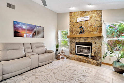 Living Room with Firewood Photographed by a Real Estate Photographer in Pinellas County, FL